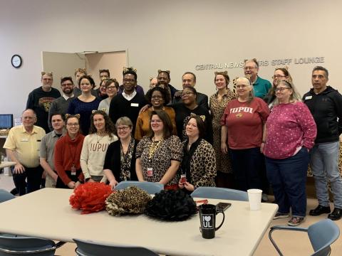 Library faculty and staff pictured with Chancellor Paydar 