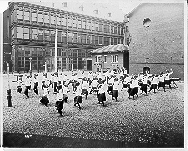 Normal College students fencing class outside the Athenaeum.